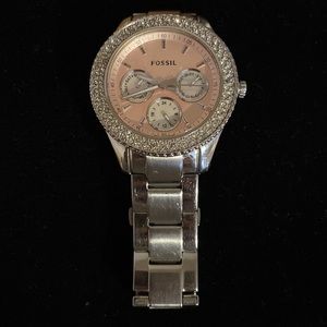 Fossil watch. Silver with light pink face with stones.